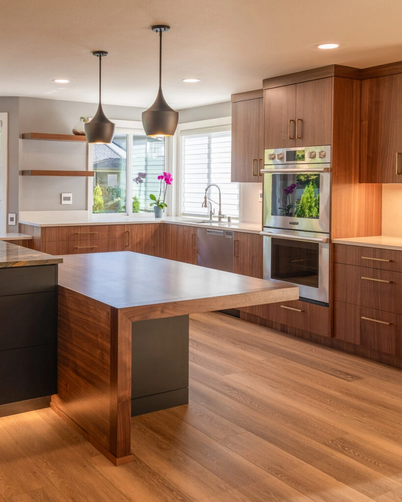 Modern luxury kitchen featuring custom cabinetry, quartz surfaces, and a functional open-plan island design.