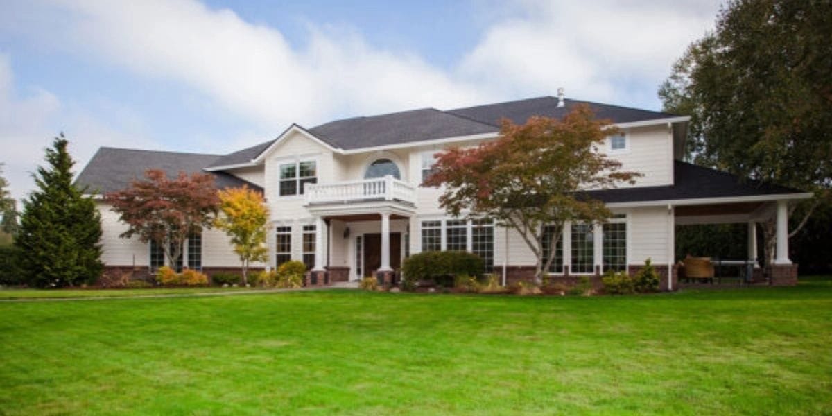 Home renovation project with contractor reviewing building plans and permits | Do You Need a Permit to Remodel Your Home
