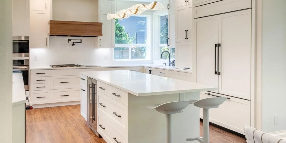 Bright open concept kitchen remodel featuring a spacious island, custom cabinetry, and seamless flow into the living area | Open Concept Kitchen Remodel